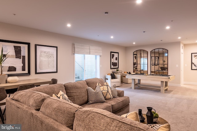 carpeted living room featuring pool table