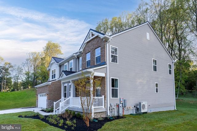 view of property exterior featuring a garage, ac unit, a yard, and a porch