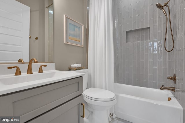 full bathroom with vanity, toilet, and shower / bath combo