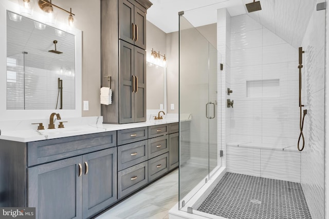 bathroom featuring vanity and walk in shower