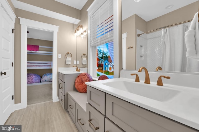 bathroom featuring vanity and a shower with curtain