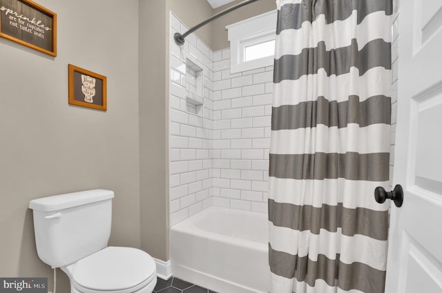 bathroom with toilet, shower / bath combination with curtain, and tile patterned floors