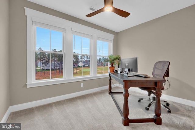 home office featuring ceiling fan and carpet