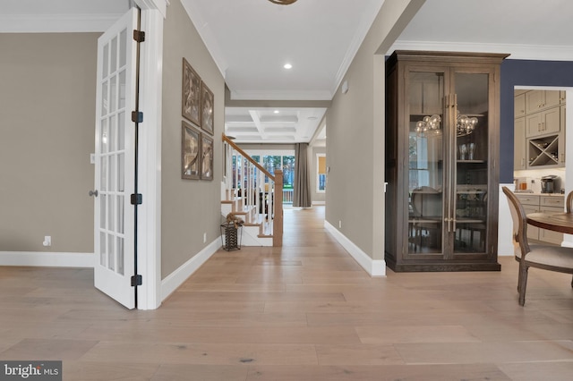 hall with crown molding, coffered ceiling, light wood-type flooring, and beamed ceiling