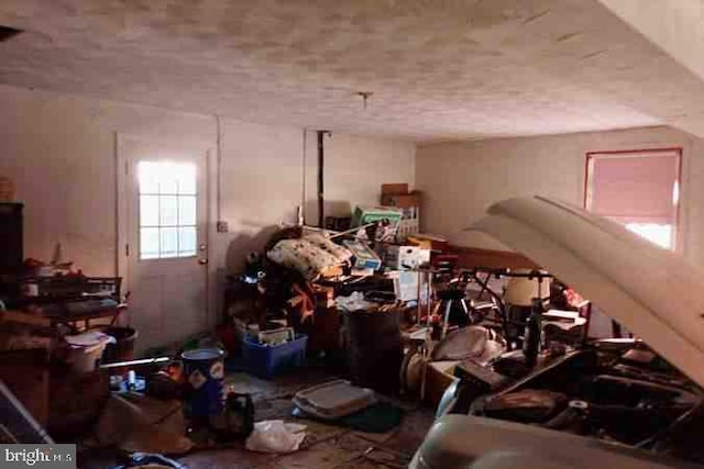 miscellaneous room featuring a textured ceiling