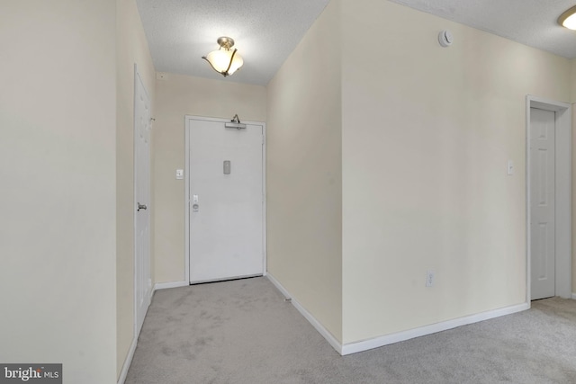 interior space featuring a textured ceiling