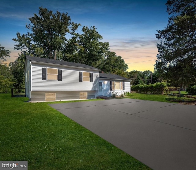 view of front of home with a lawn