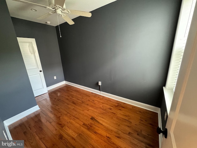 unfurnished room with wood-type flooring and ceiling fan