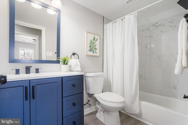 full bathroom featuring shower / bathtub combination with curtain, wood-type flooring, toilet, and vanity