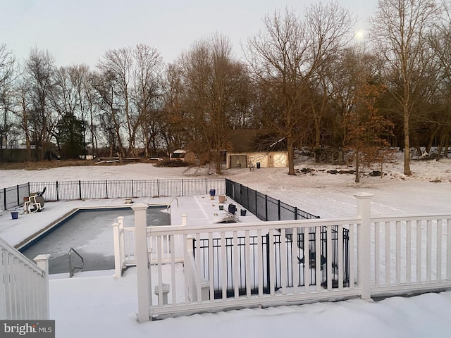 view of snow covered pool