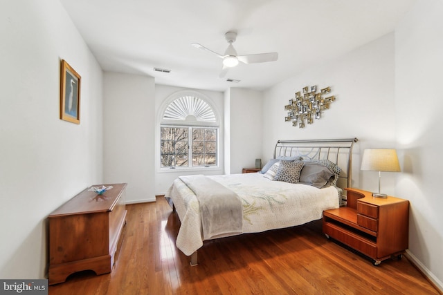 bedroom featuring ceiling fan and light wood-type flooring