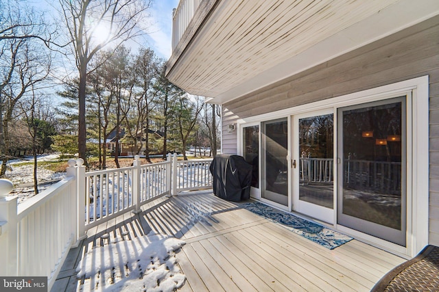 wooden terrace with grilling area