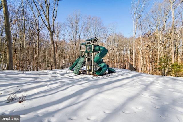 view of snow covered playground