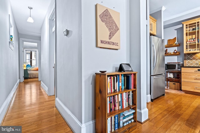 hallway featuring light hardwood / wood-style flooring