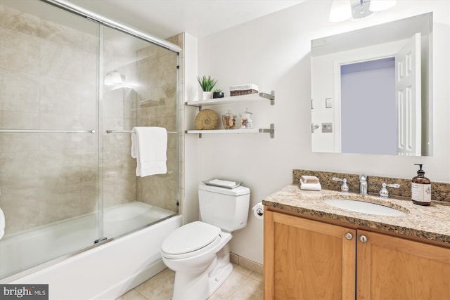 full bathroom featuring tile patterned flooring, vanity, enclosed tub / shower combo, and toilet