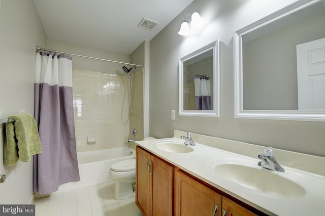 full bathroom featuring shower / tub combo, vanity, tile patterned flooring, and toilet