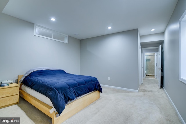 bedroom with light carpet