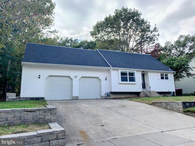 ranch-style home featuring a garage