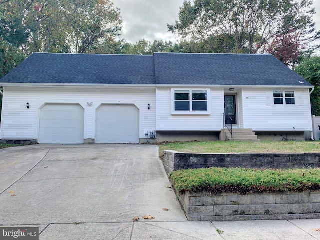 ranch-style home with a garage