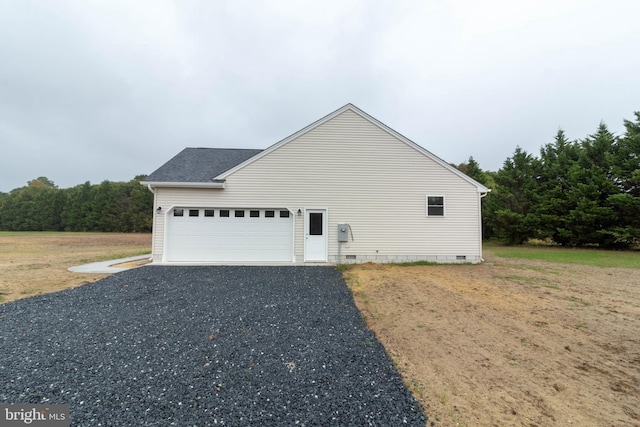 view of property exterior featuring a garage