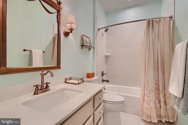 full bathroom featuring vanity, toilet, tile patterned flooring, and shower / bath combo with shower curtain