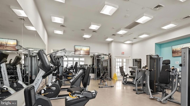 gym featuring french doors