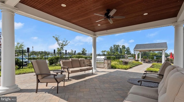 view of patio featuring area for grilling, an outdoor hangout area, and ceiling fan