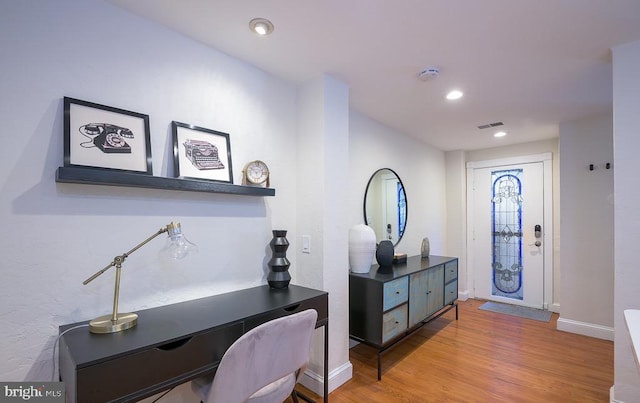 foyer with light hardwood / wood-style flooring