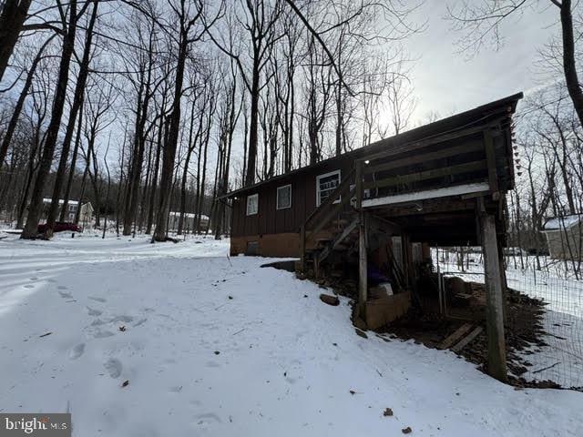 view of snow covered property