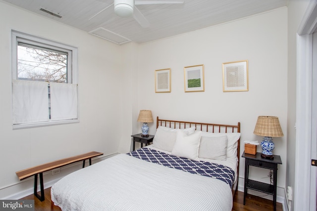 bedroom featuring ceiling fan and dark hardwood / wood-style flooring