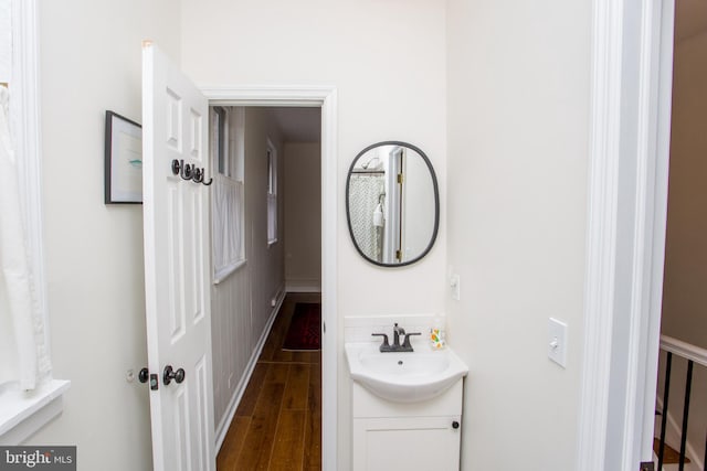 bathroom featuring vanity and hardwood / wood-style flooring