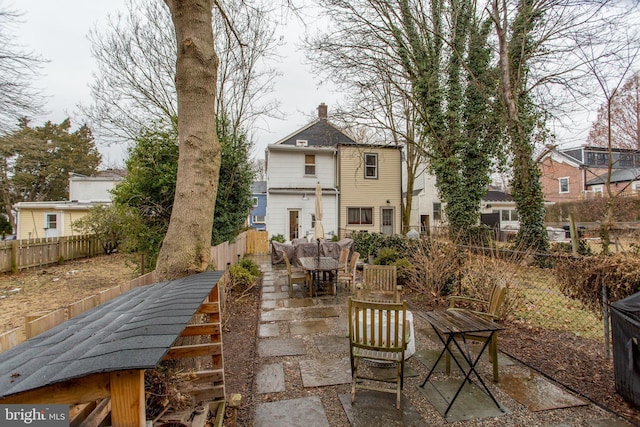 rear view of house featuring a patio area