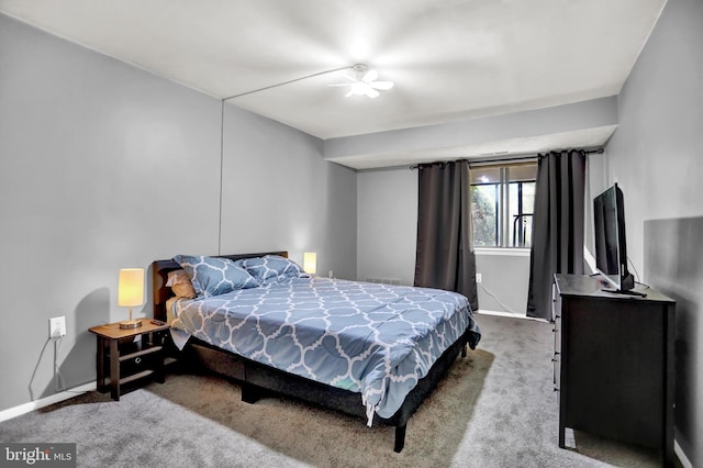 bedroom featuring ceiling fan and light colored carpet