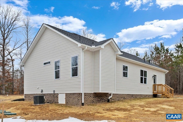 view of side of property with cooling unit