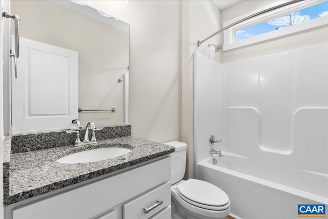 full bathroom featuring vanity, toilet, and shower / tub combination