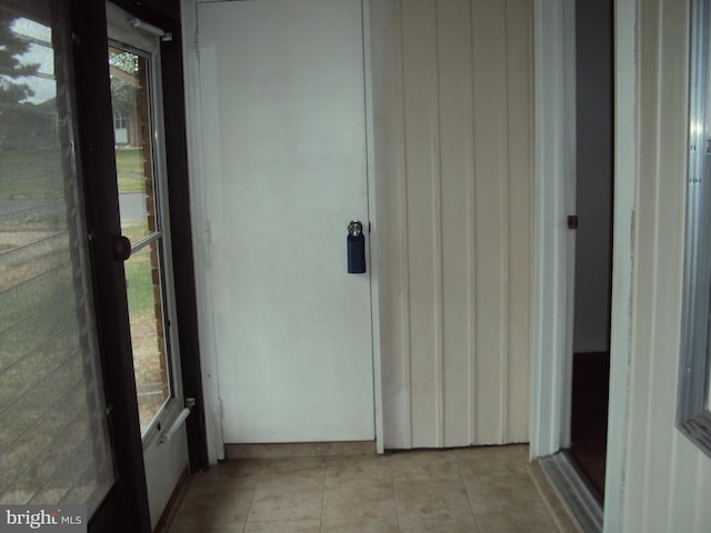 interior space with light tile patterned floors