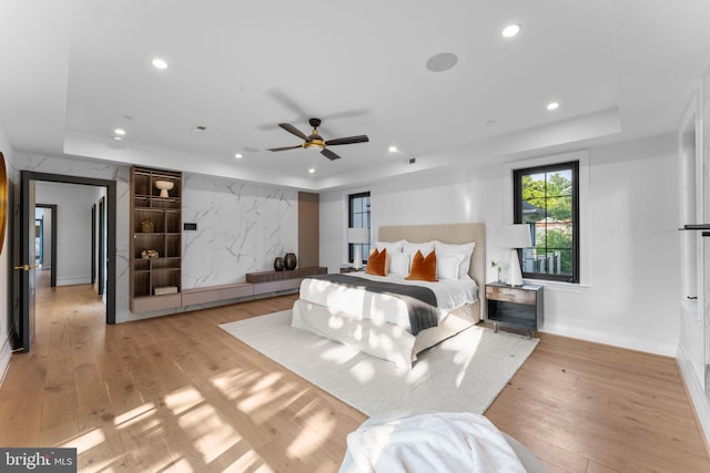 3819 NW Albemarle St NW, Washington, DC 20016 - bedroom featuring light wood finished floors, recessed lighting, and a tray ceiling
