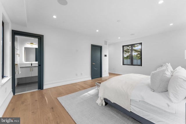 3819 NW Albemarle St NW, Washington, DC 20016 - bedroom featuring recessed lighting, light wood finished floors, and ensuite bath