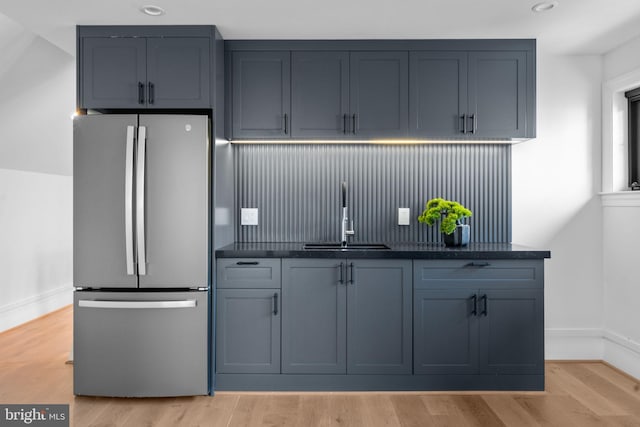 3819 NW Albemarle St NW, Washington, DC 20016 - kitchen featuring freestanding refrigerator, light wood-type flooring, recessed lighting, and tasteful backsplash