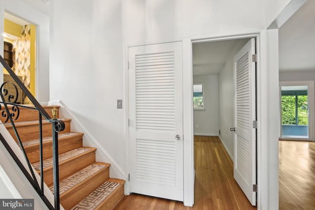 906 N Belgrade Rd, Silver Spring, MD 20902 - staircase featuring wood finished floors and baseboards