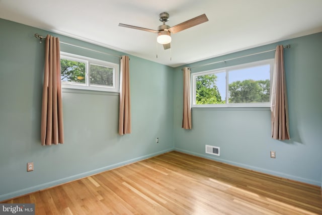 906 N Belgrade Rd, Silver Spring, MD 20902 - empty room featuring wood finished floors, baseboards, and a ceiling fan