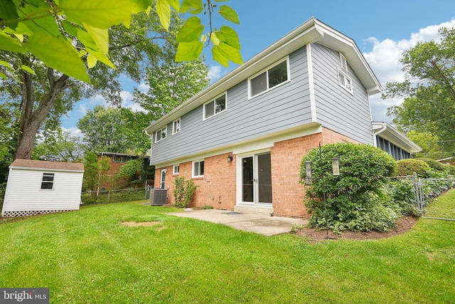 906 N Belgrade Rd, Silver Spring, MD 20902 - back of property with brick siding, central air condition unit, french doors, and a patio