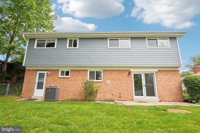 906 N Belgrade Rd, Silver Spring, MD 20902 - back of property featuring brick siding and central air condition unit