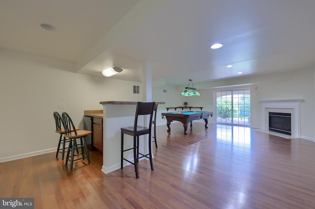 rec room with dark hardwood / wood-style flooring and billiards