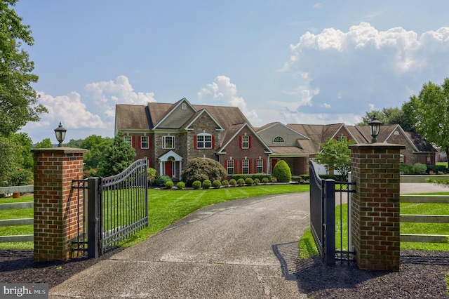 view of front of home with a front lawn