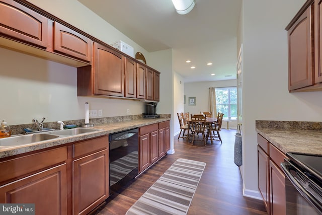 kitchen featuring dark hardwood / wood-style flooring, sink, electric range, and black dishwasher