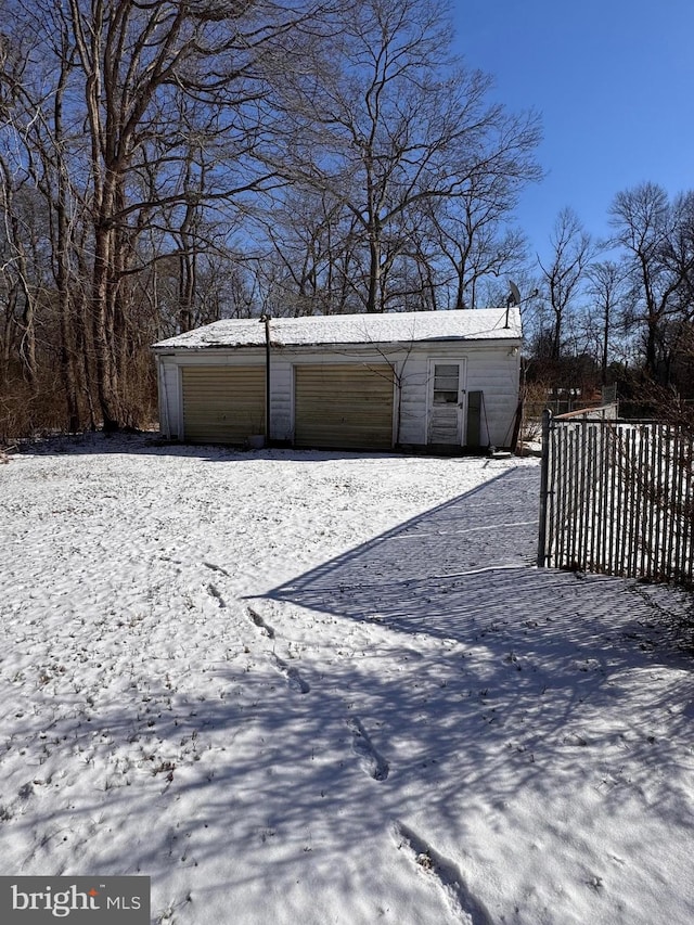 exterior space with a garage