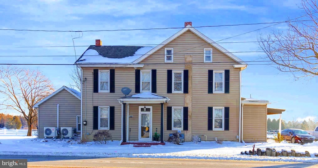 view of front of house featuring ac unit