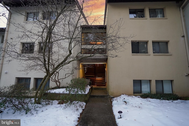 view of snow covered building