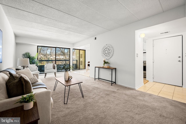 living room with light colored carpet